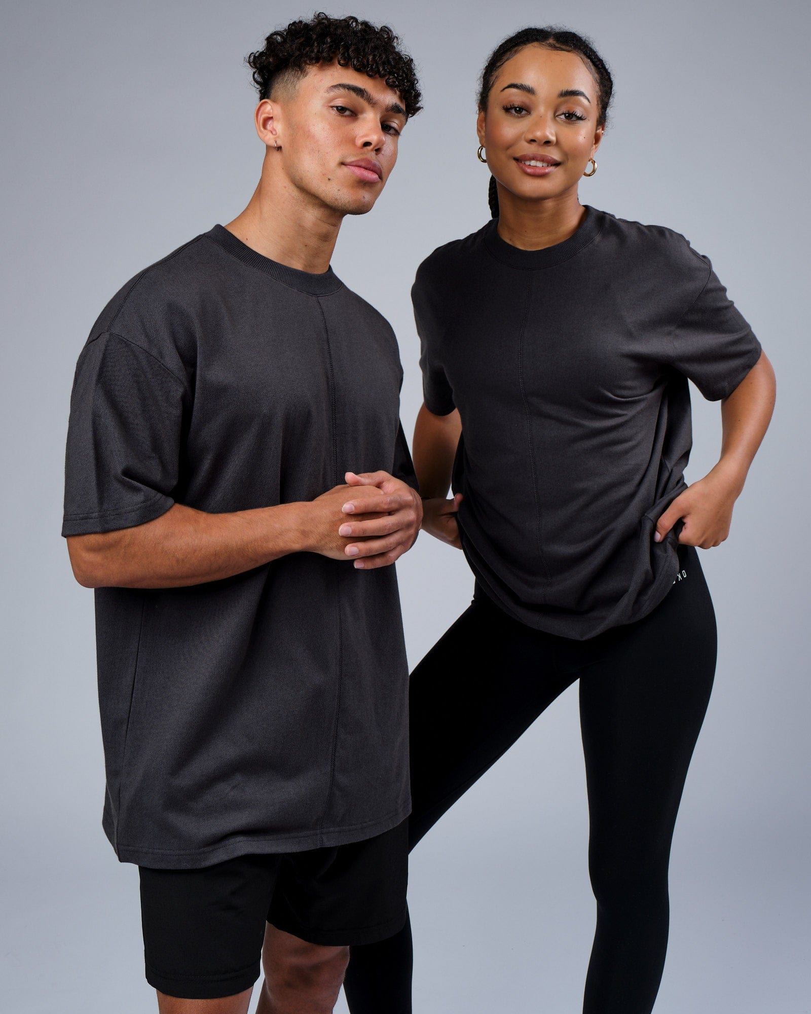 Model wearing Unisex Heavy Hitter Heavyweight Tee Oversize - Phantom