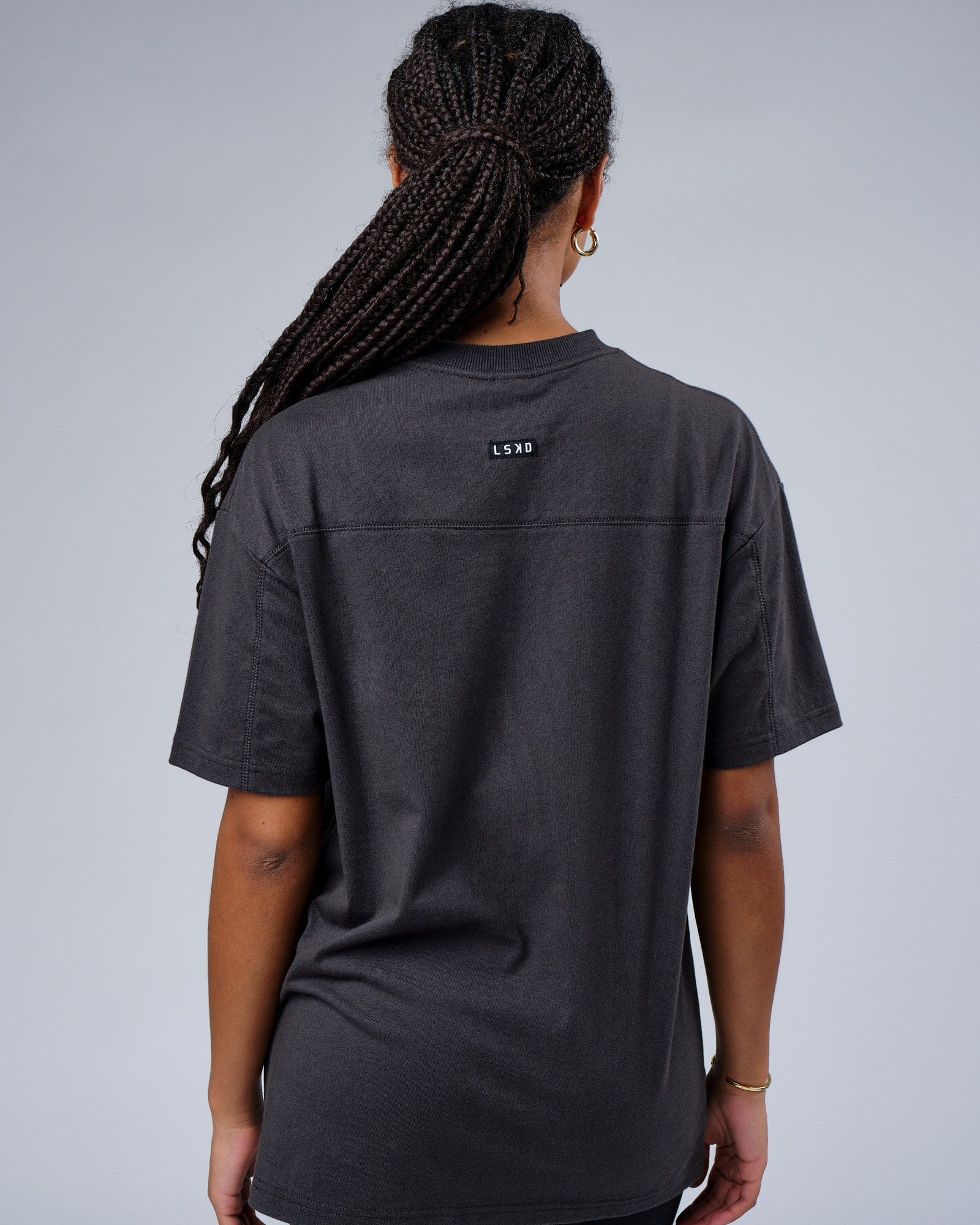 Model wearing Unisex Heavy Hitter Heavyweight Tee Oversize - Phantom