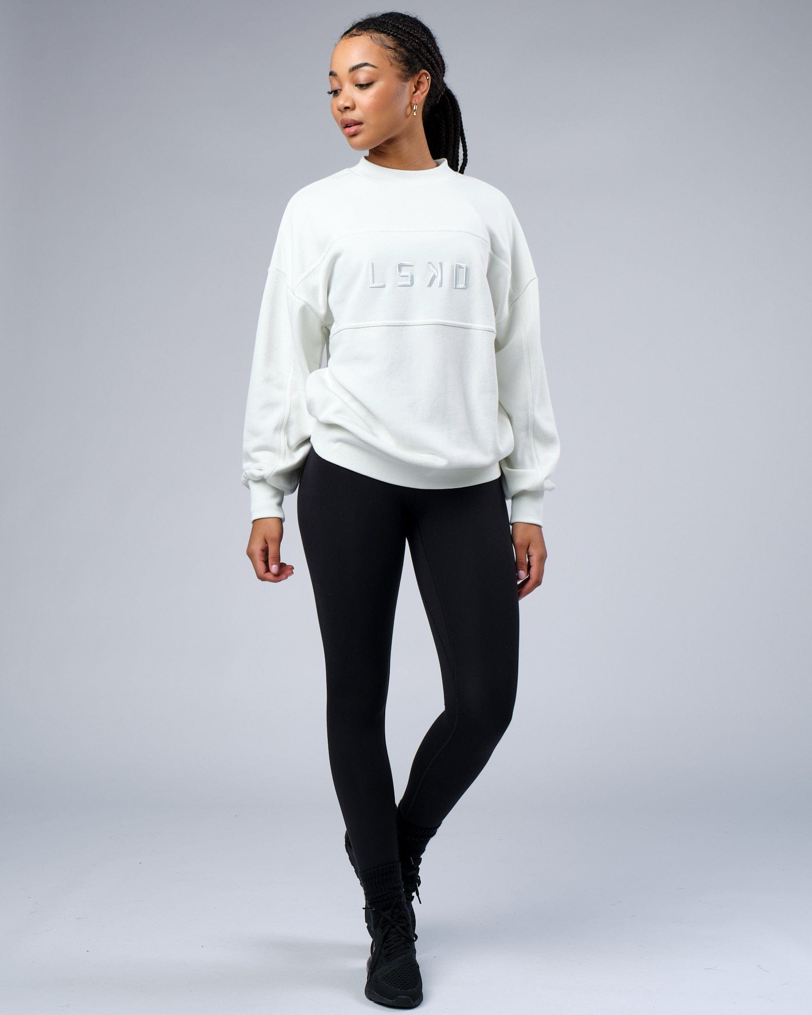 Model wearing Unisex Slice Sweater Oversize - Ice