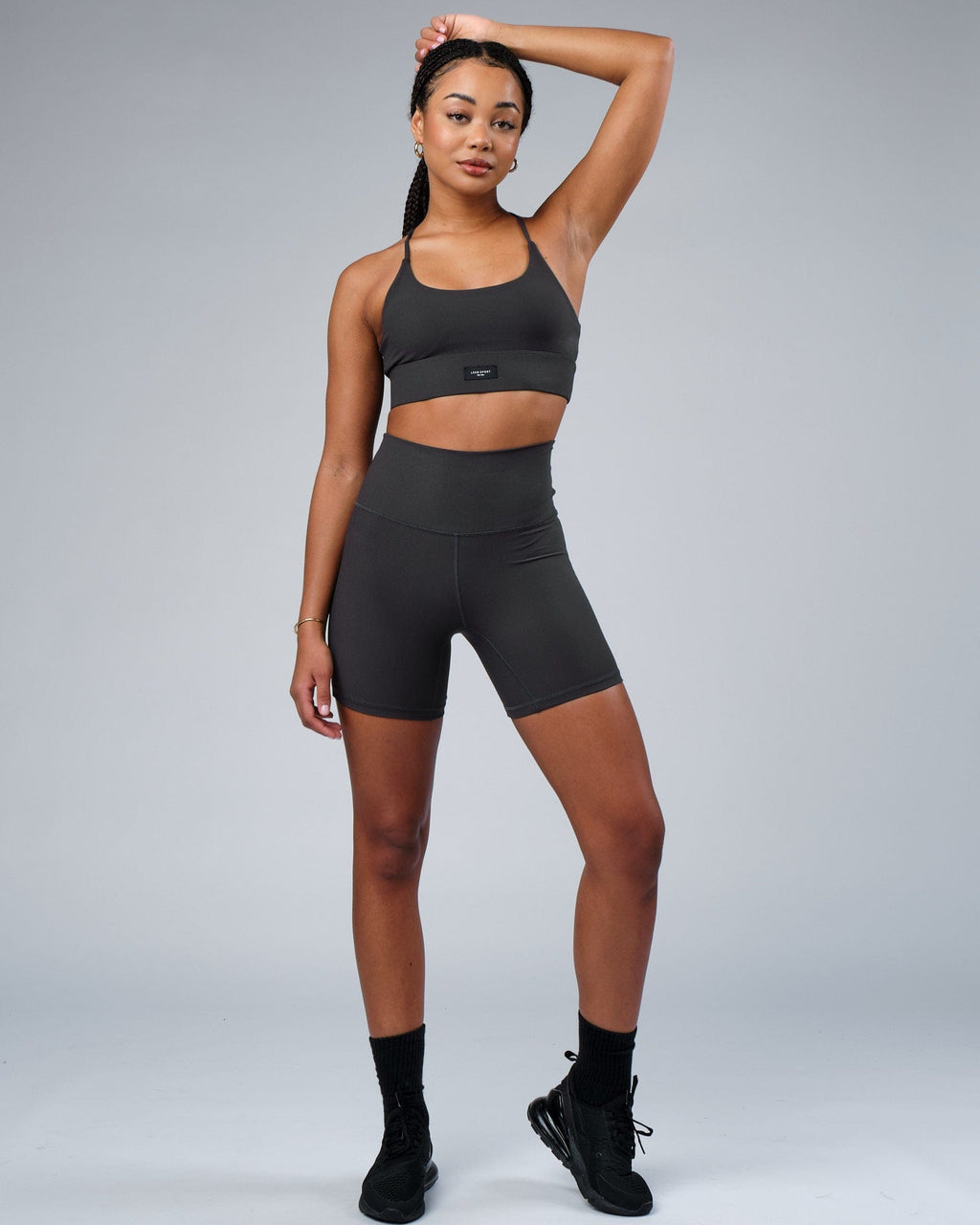 Model wearing Reserves Ribbed Sports Bra - Pirate Black