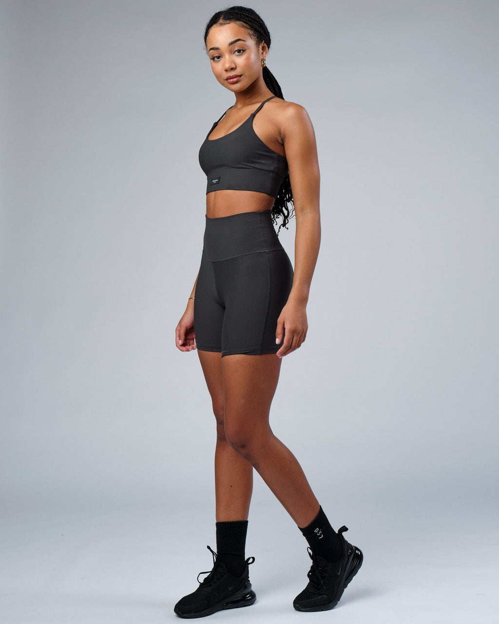 Model wearing Reserves Ribbed Sports Bra - Pirate Black