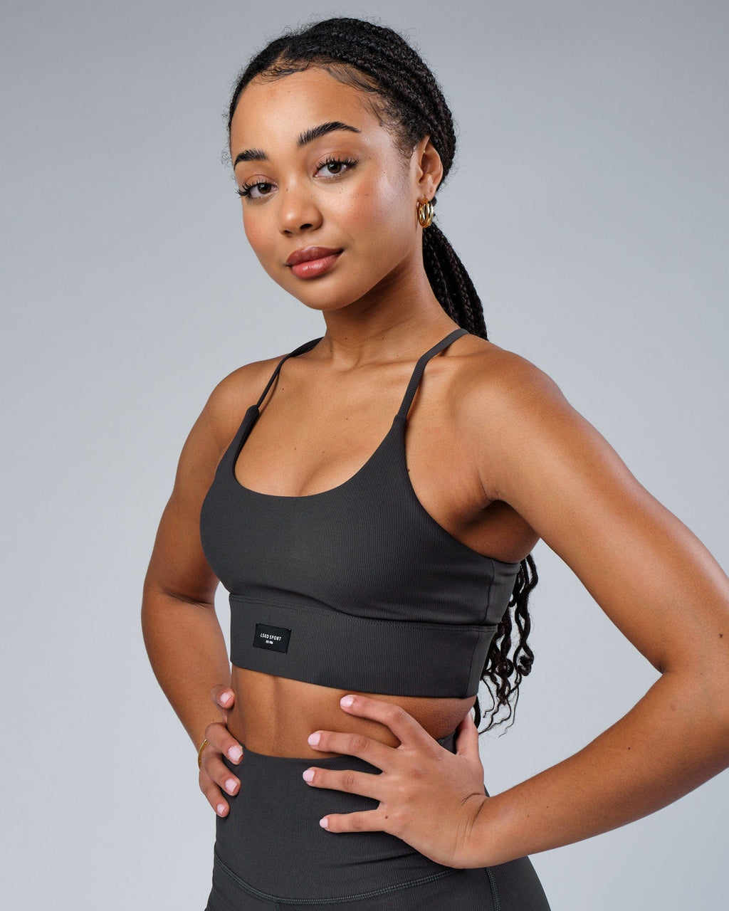 Model wearing Reserves Ribbed Sports Bra - Pirate Black