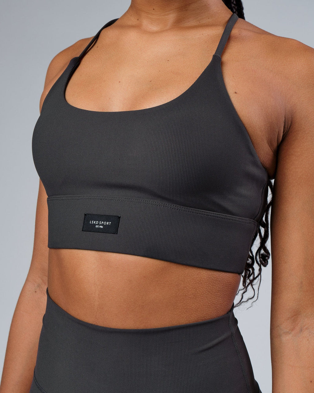 Model wearing Reserves Ribbed Sports Bra - Pirate Black