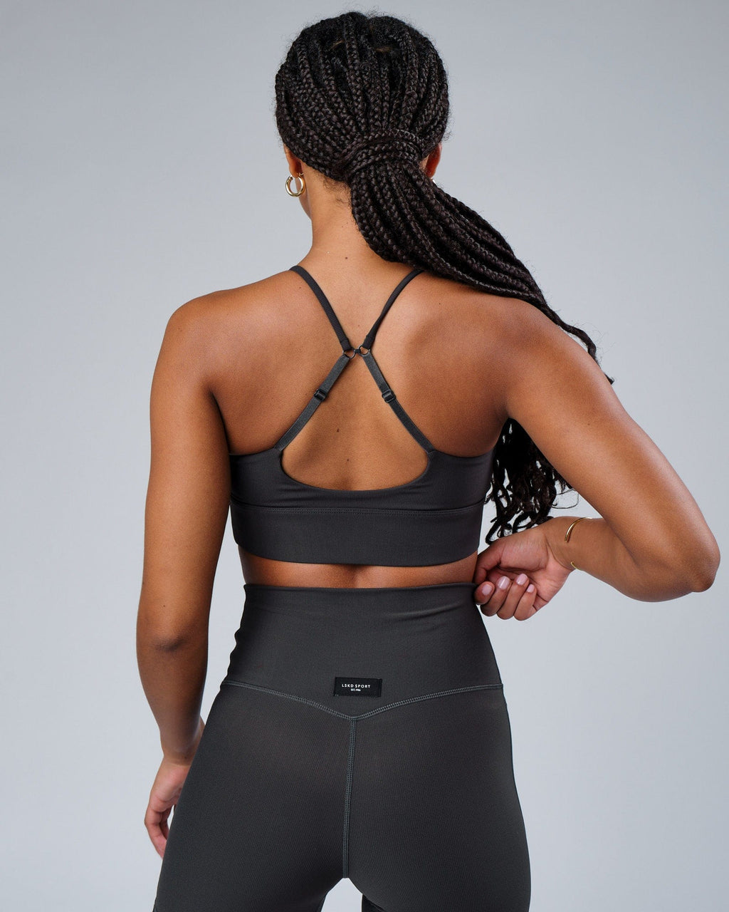 Model wearing Reserves Ribbed Sports Bra - Pirate Black