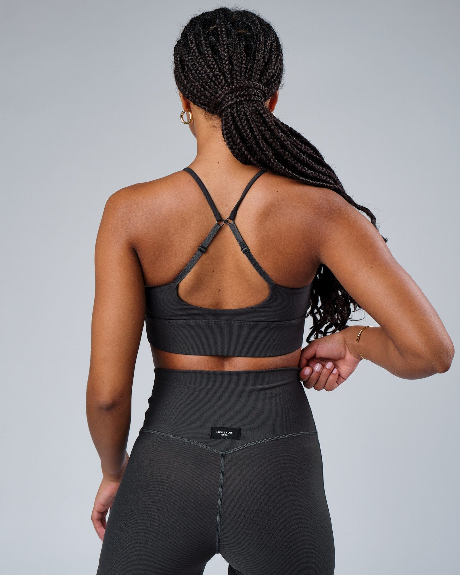 Model wearing Reserves Ribbed Sports Bra - Pirate Black