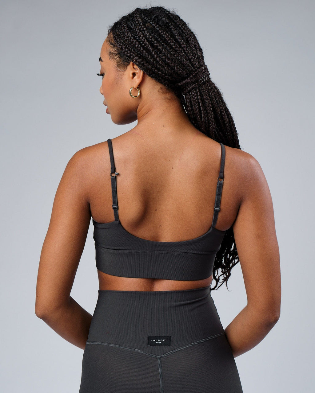 Model wearing Reserves Ribbed Sports Bra - Pirate Black