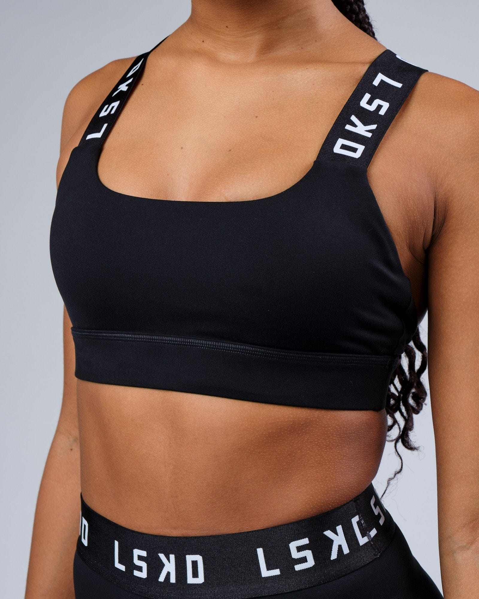 Model wearing Competition Sports Bra - Black White