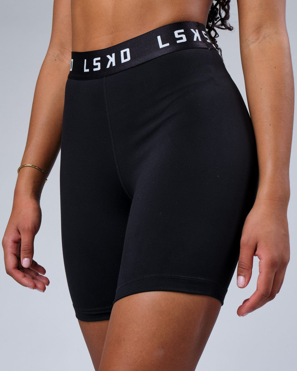 Model wearing Competition Mid Short Tight - Black White