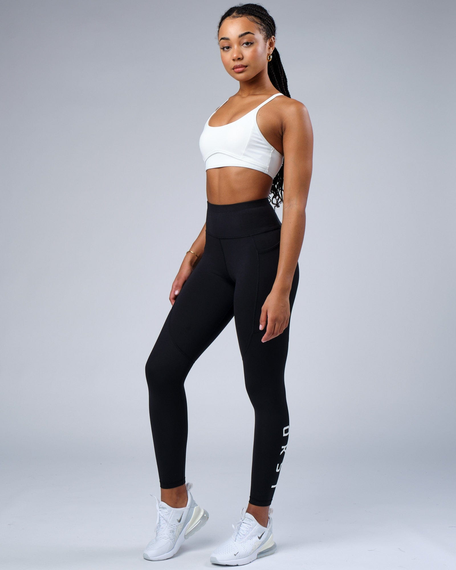 Model wearing Contour Sports Bra - White