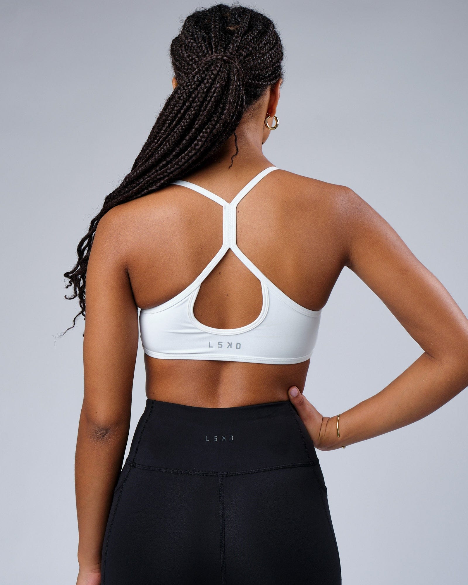 Model wearing Contour Sports Bra - White