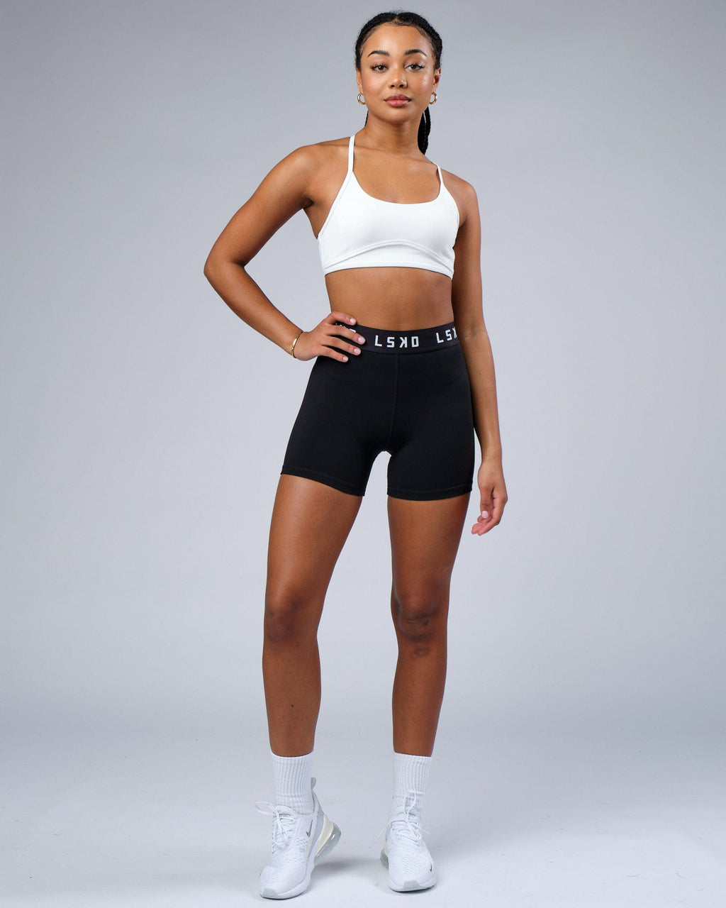 Model wearing Contour Sports Bra - White