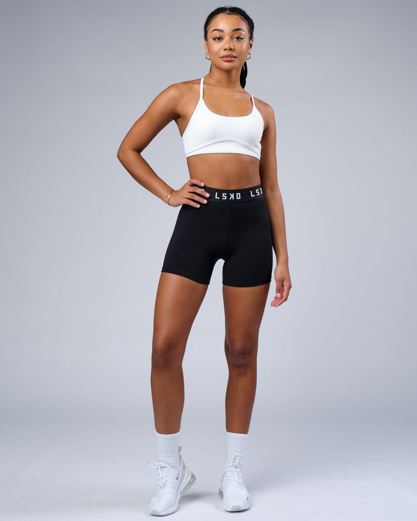 Model wearing Contour Sports Bra - White