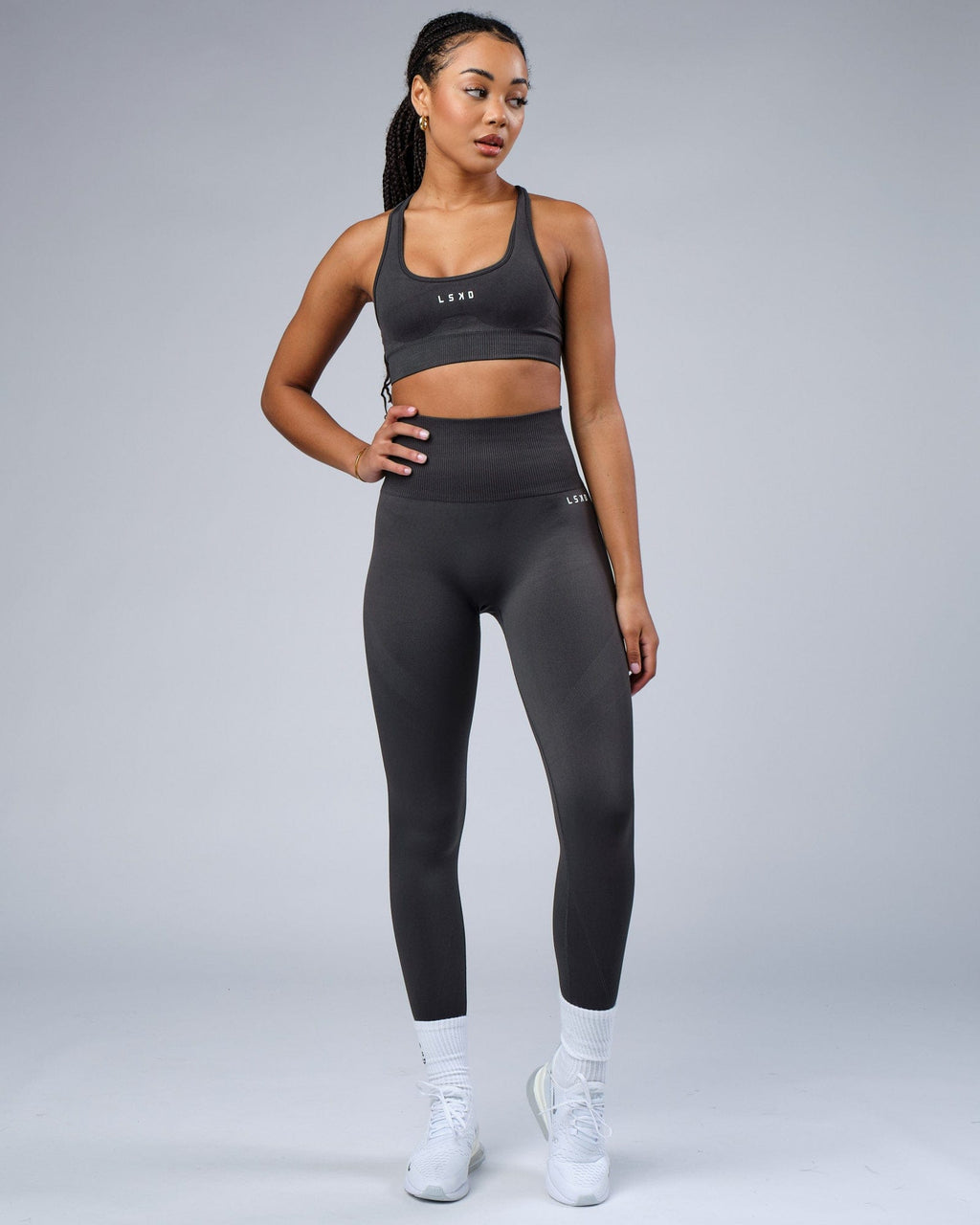 Model wearing Limitless Seamless Full Length Tights - Charcoal