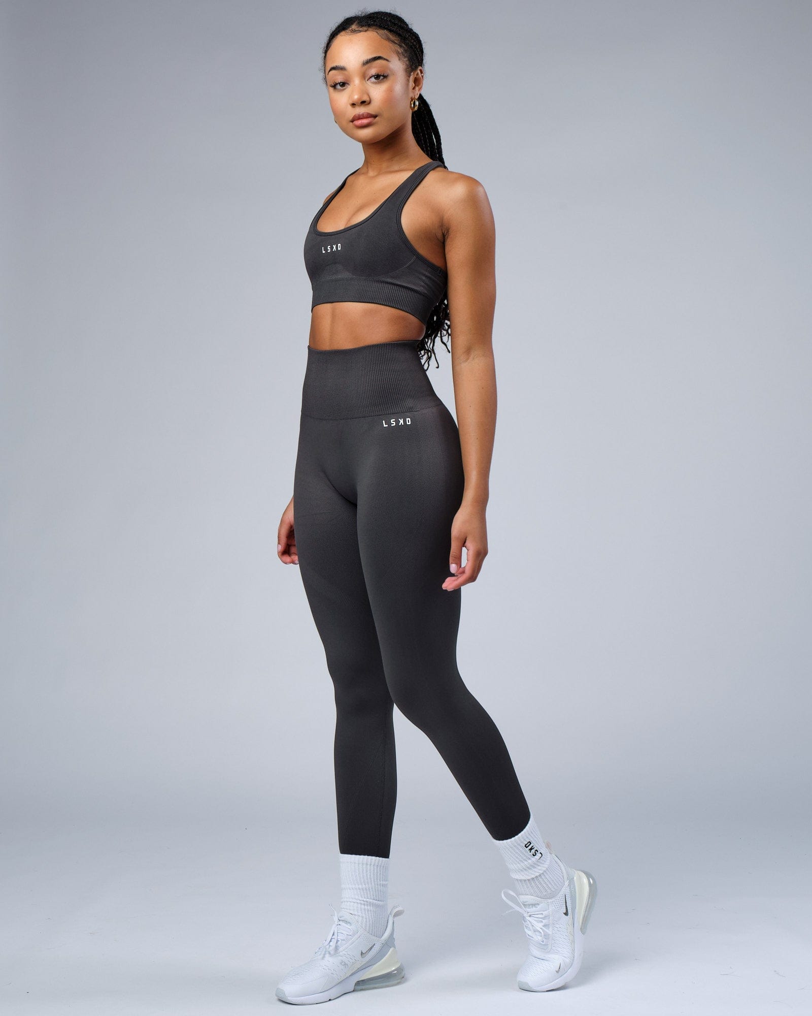 Model wearing Limitless Seamless Full Length Tights - Charcoal