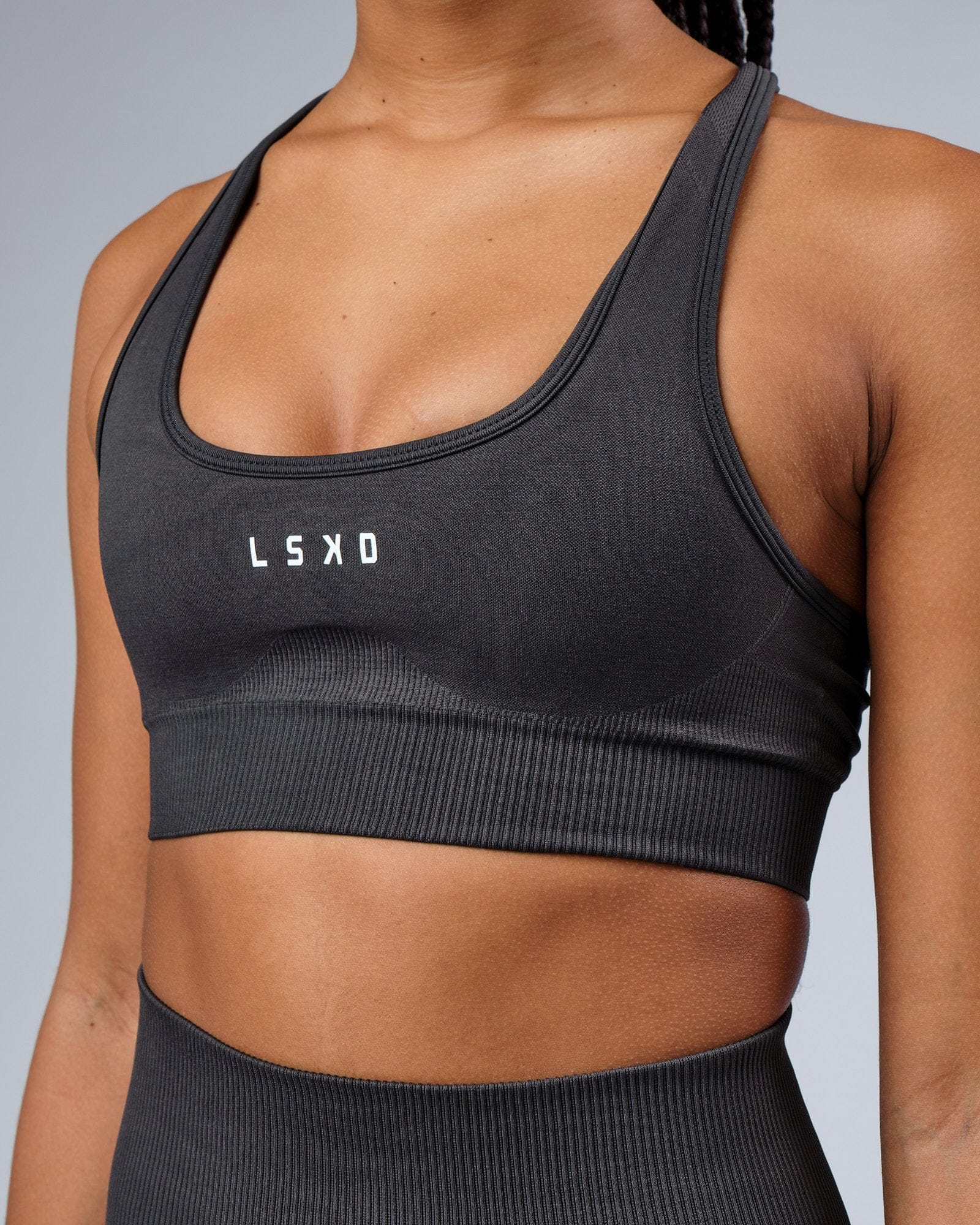 Model wearing Limitless Seamless Sports Bra - Charcoal