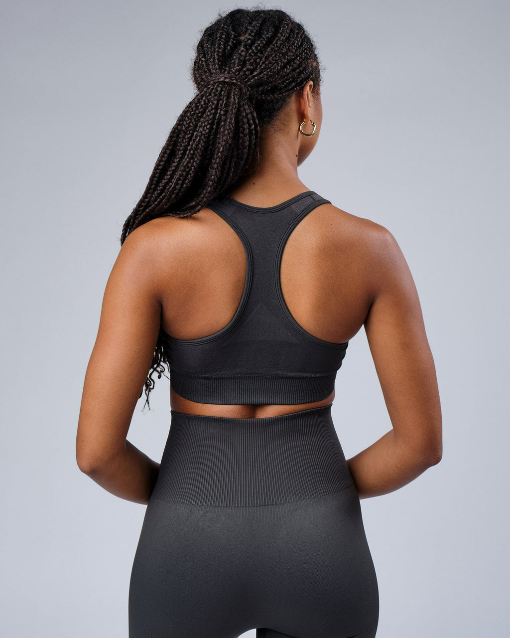 Model wearing Limitless Seamless Sports Bra - Charcoal