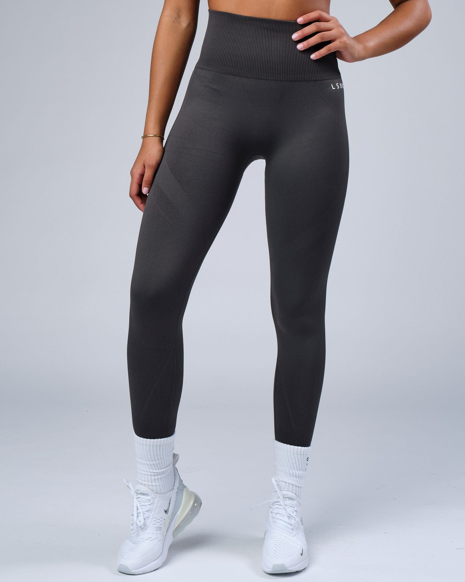 Model wearing Limitless Seamless Full Length Tights - Charcoal