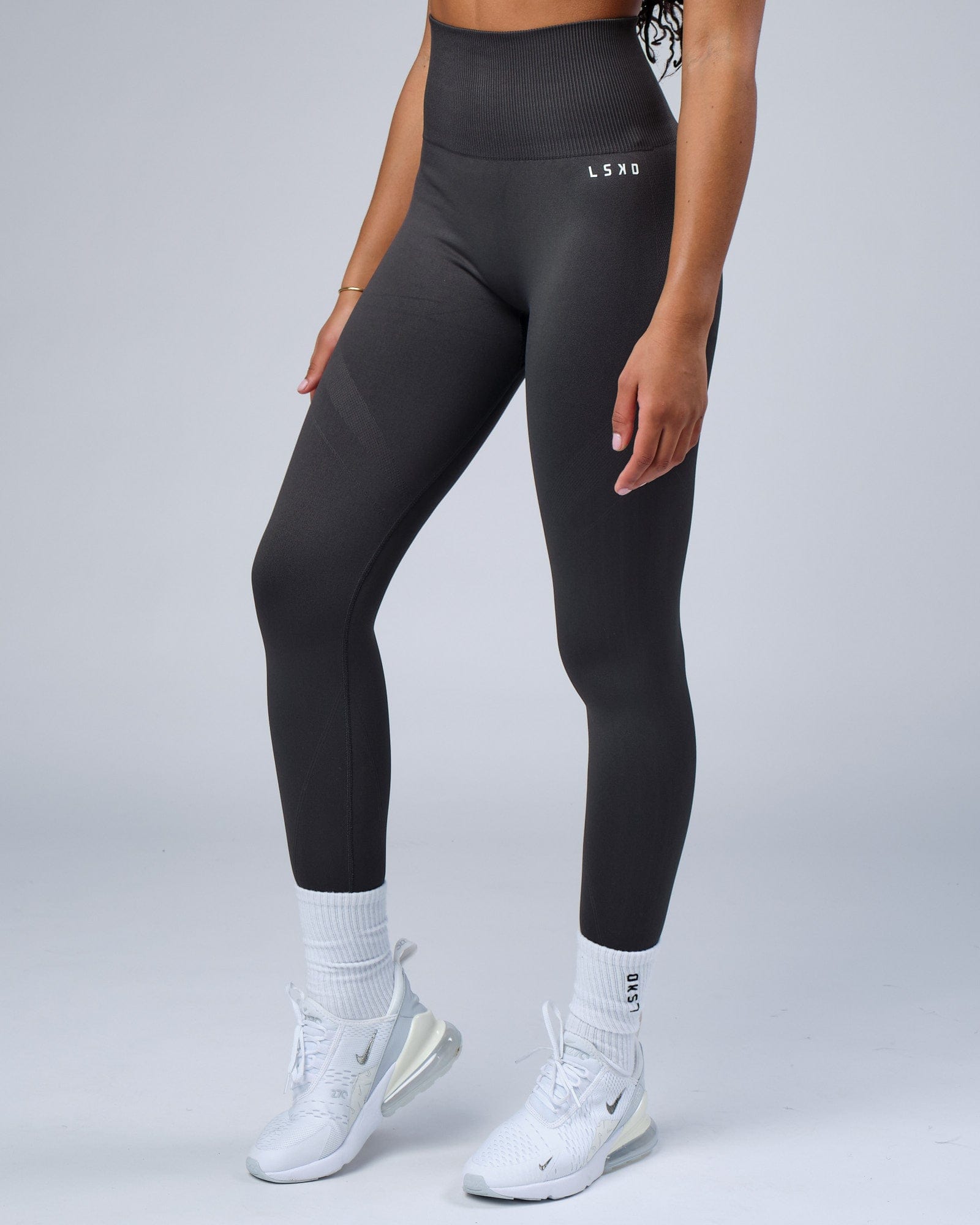 Model wearing Limitless Seamless Full Length Tights - Charcoal