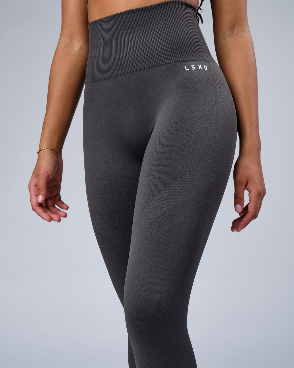 Model wearing Limitless Seamless Full Length Tights - Charcoal