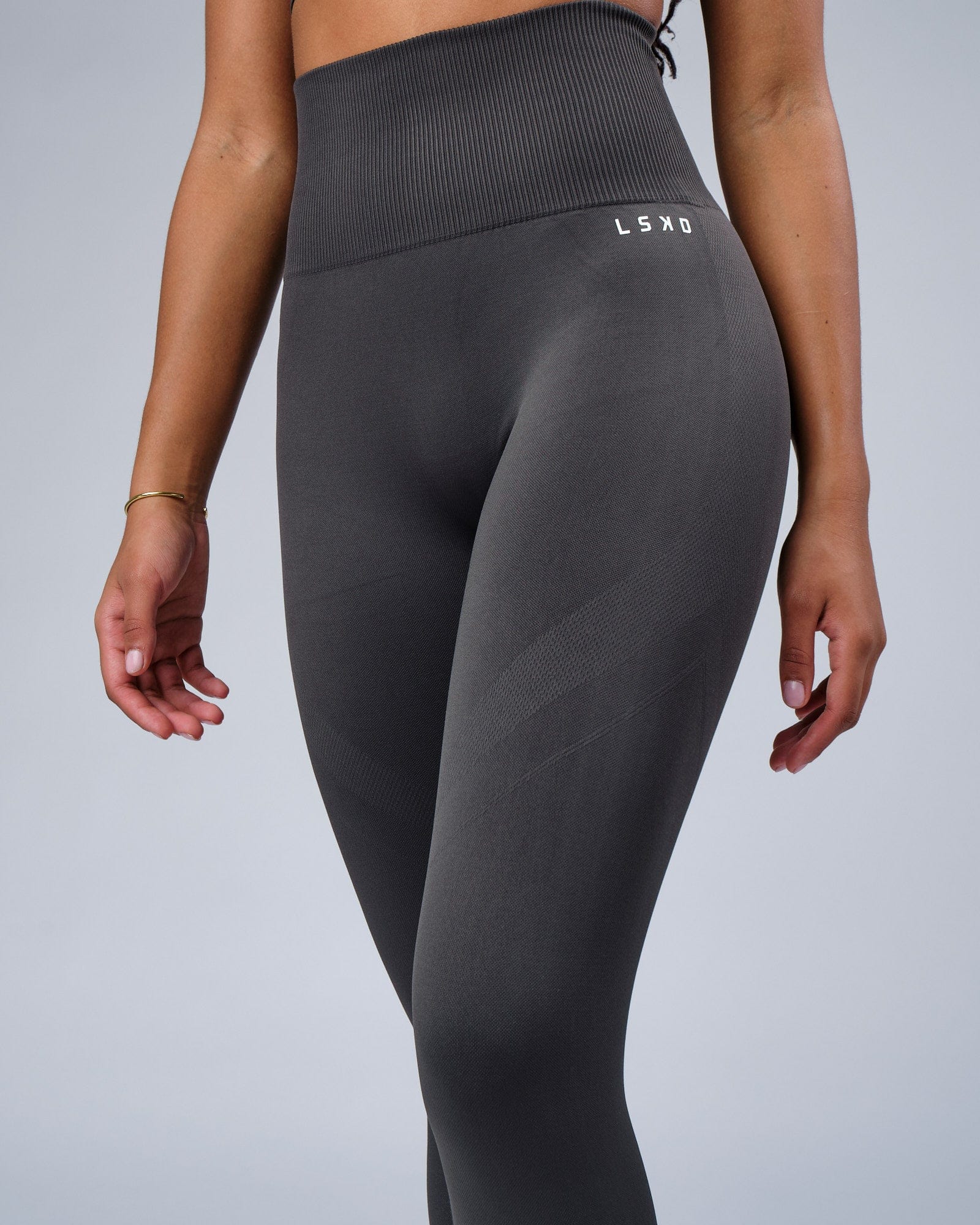 Model wearing Limitless Seamless Full Length Tights - Charcoal