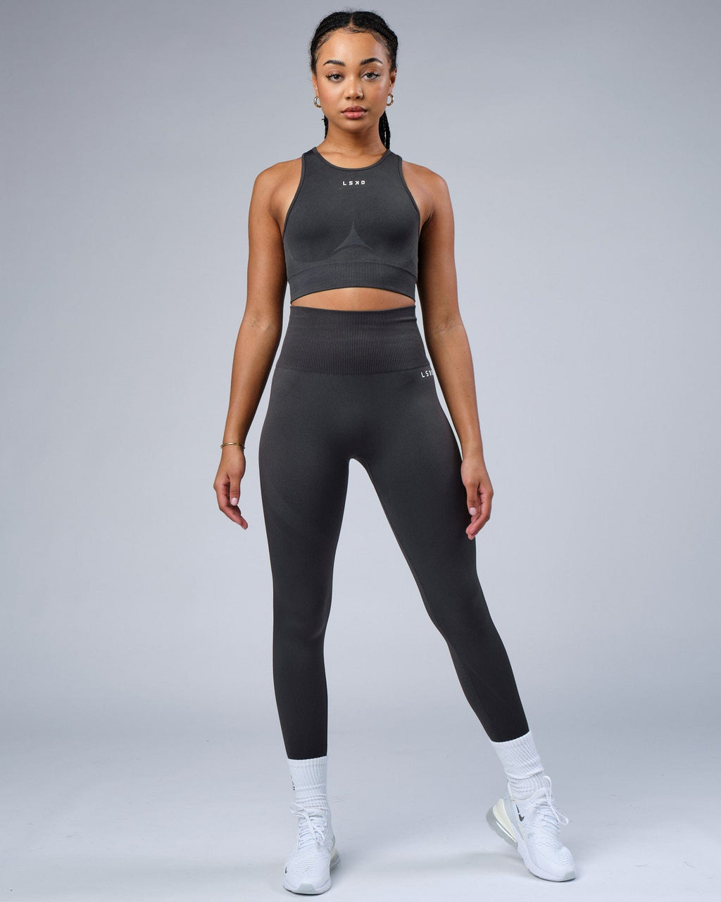 Model wearing Limitless Seamless Crop Top - Charcoal