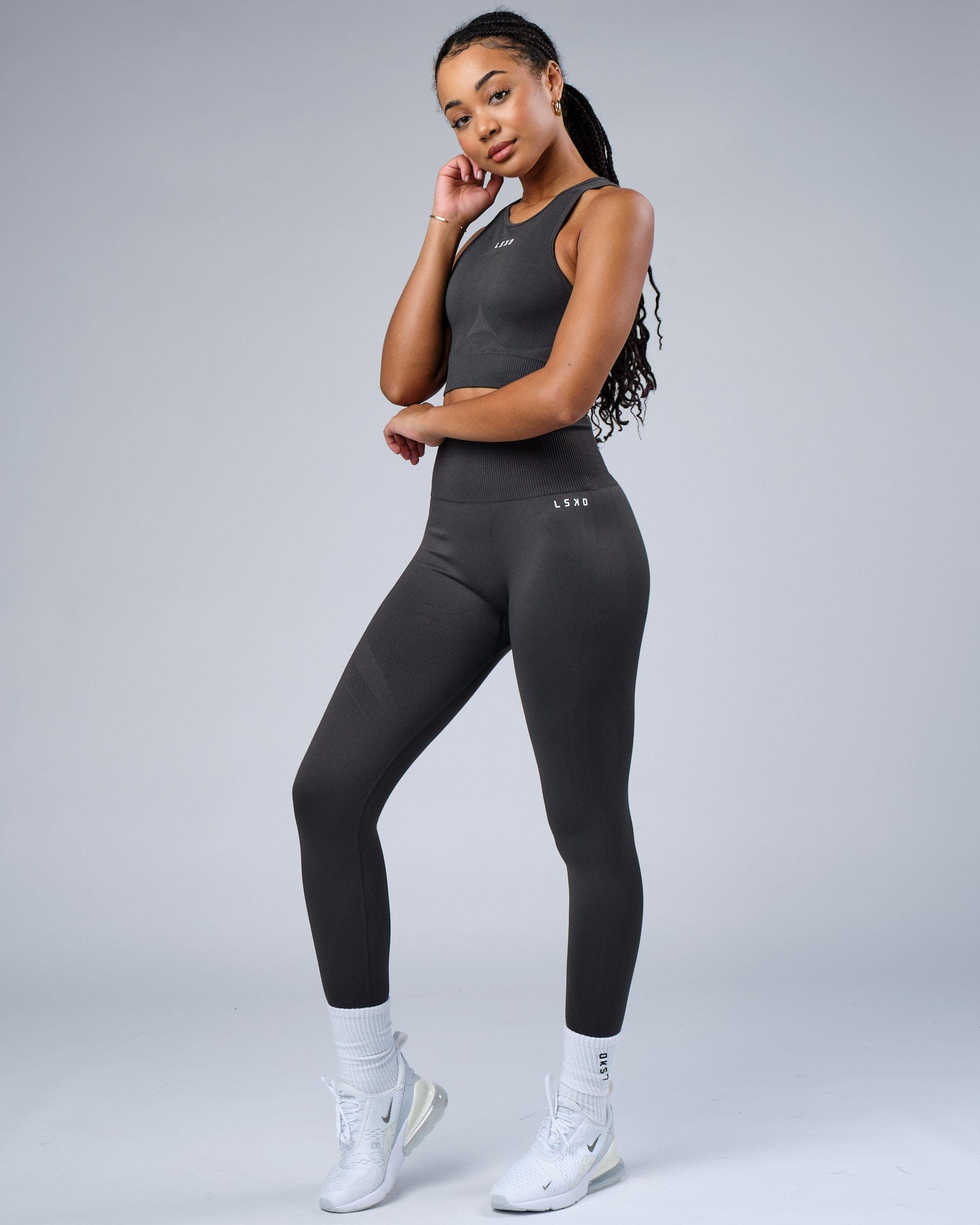 Model wearing Limitless Seamless Crop Top - Charcoal