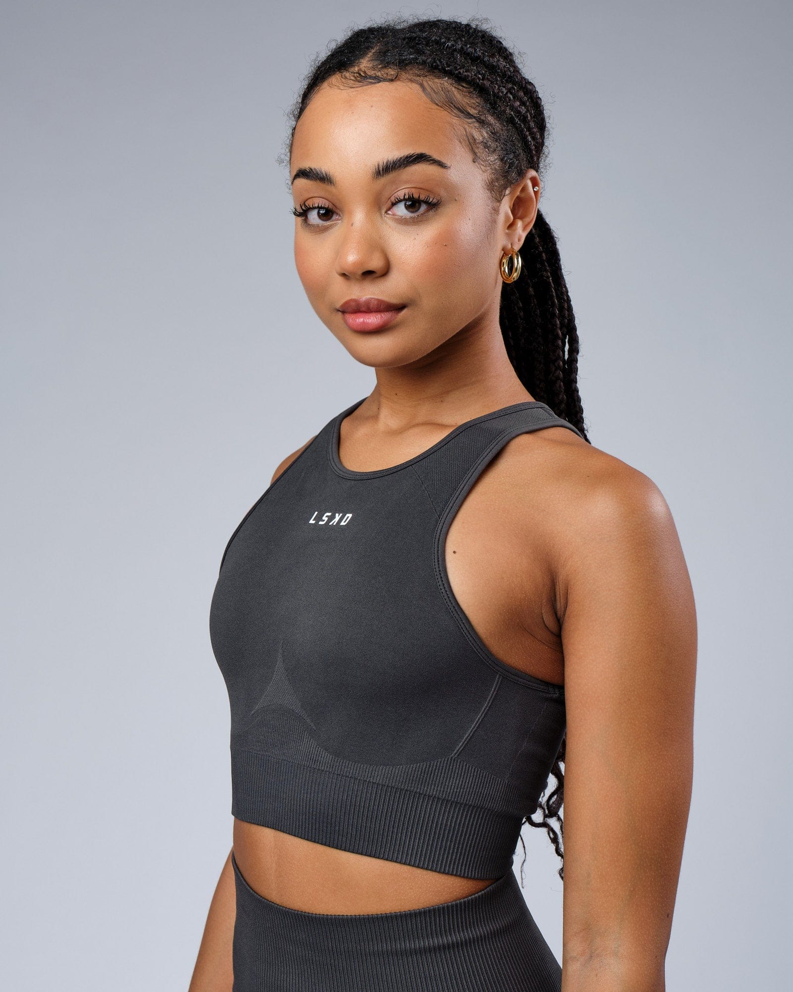 Model wearing Limitless Seamless Crop Top - Charcoal