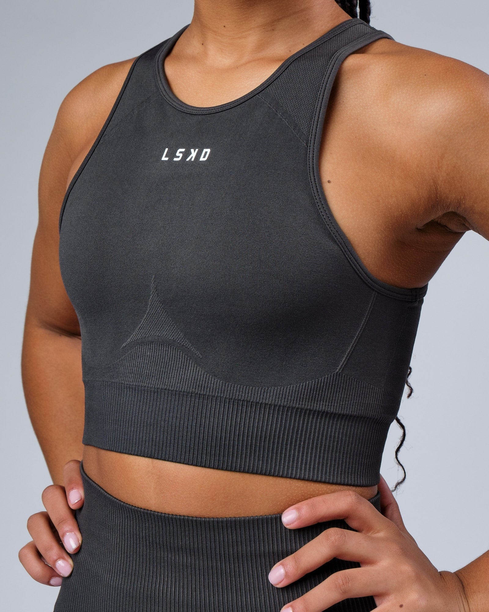 Model wearing Limitless Seamless Crop Top - Charcoal