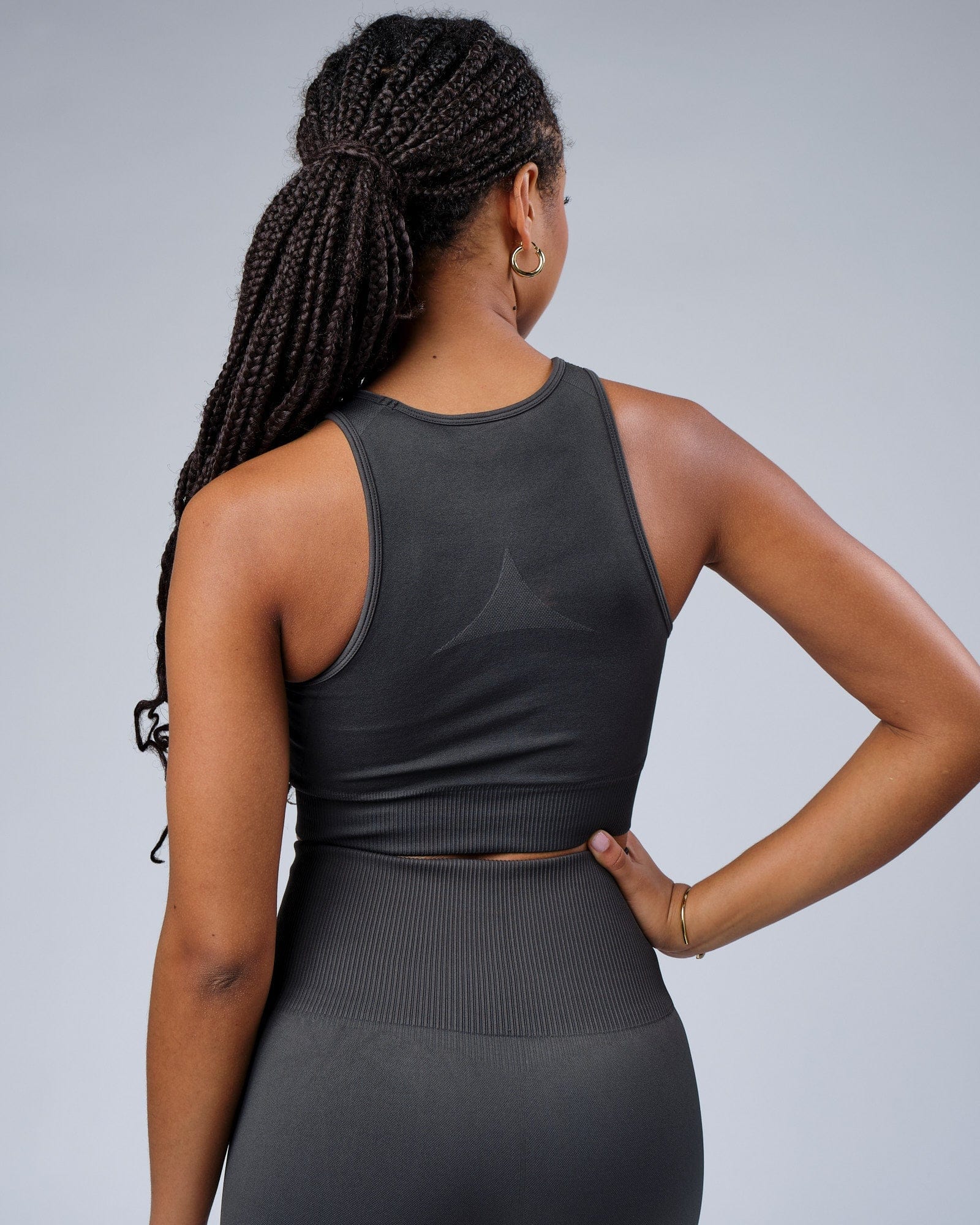 Model wearing Limitless Seamless Crop Top - Charcoal