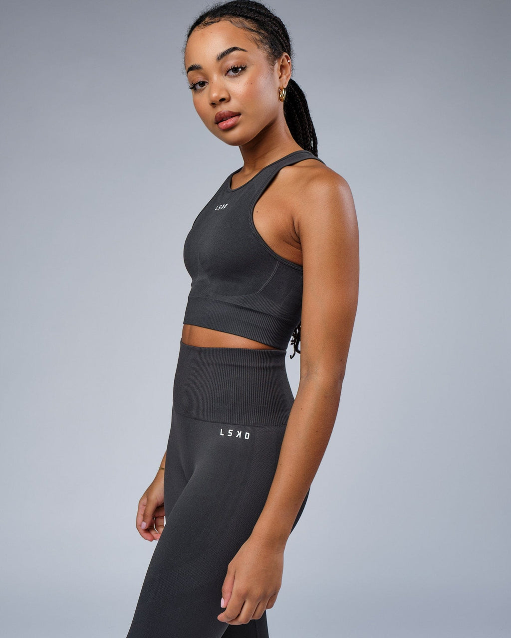 Model wearing Limitless Seamless Crop Top - Charcoal