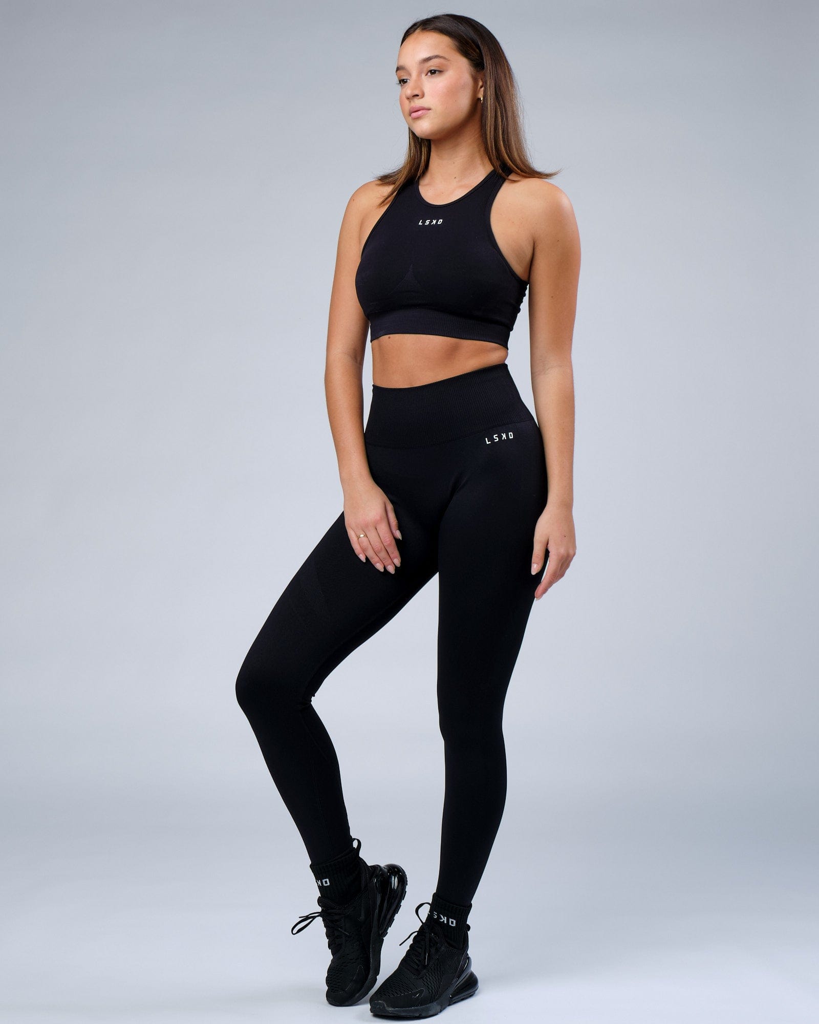 Model wearing Limitless Seamless Crop Top - Black