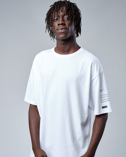 Model wearing Effort Tee Oversize - White