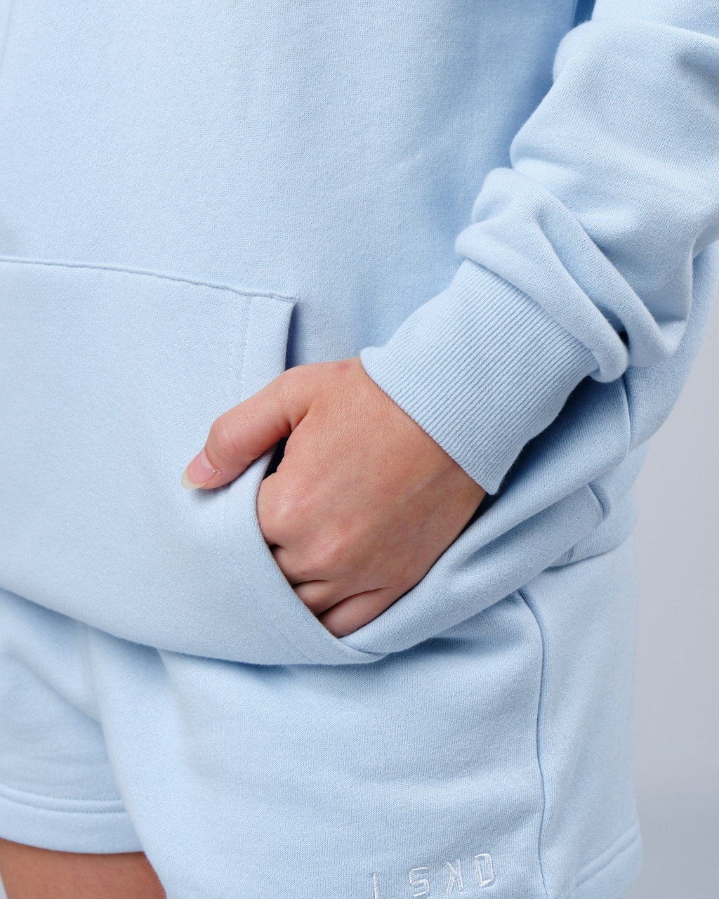 Model wearing Unisex Depth Hoodie Oversize - Sky Blue