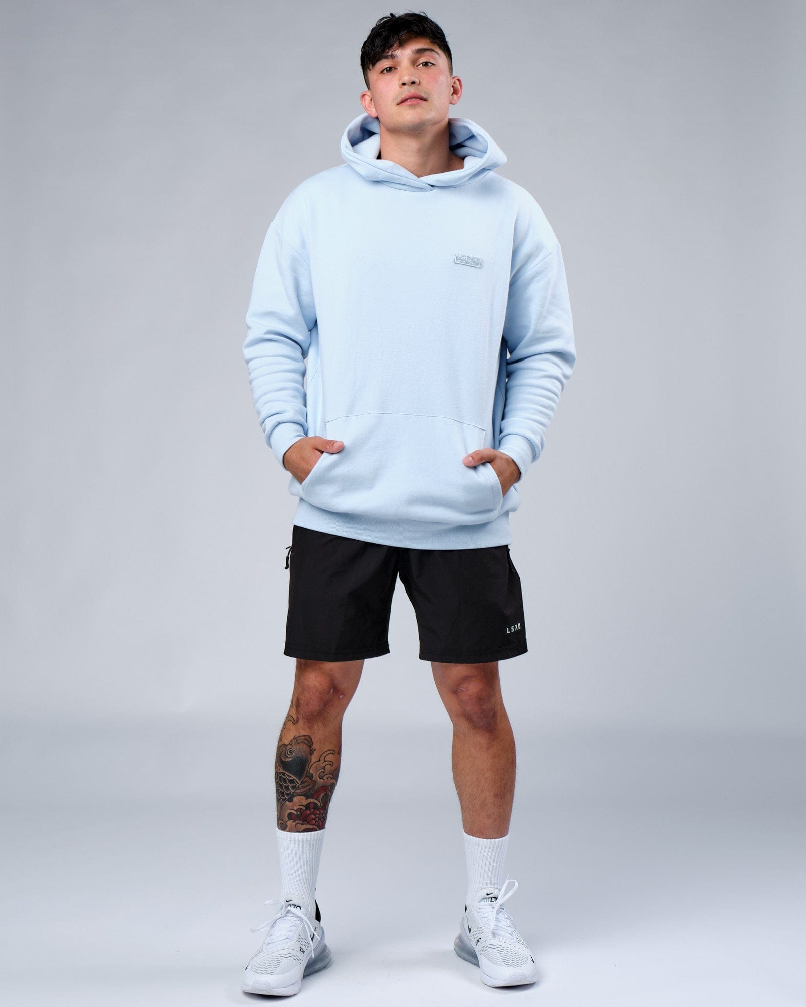Model wearing Depth Hoodie Oversize - Sky Blue