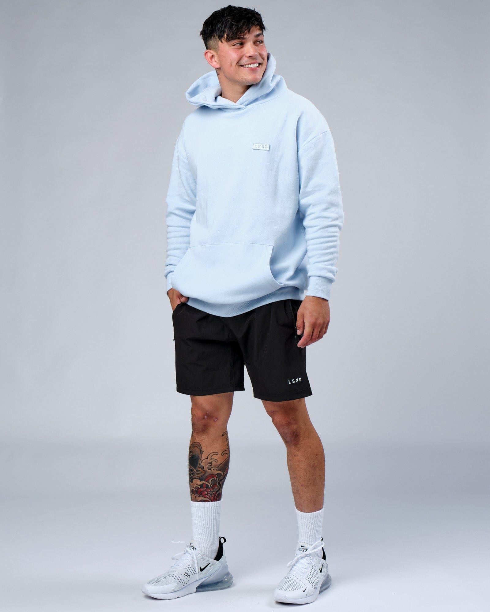 Model wearing Depth Hoodie Oversize - Sky Blue