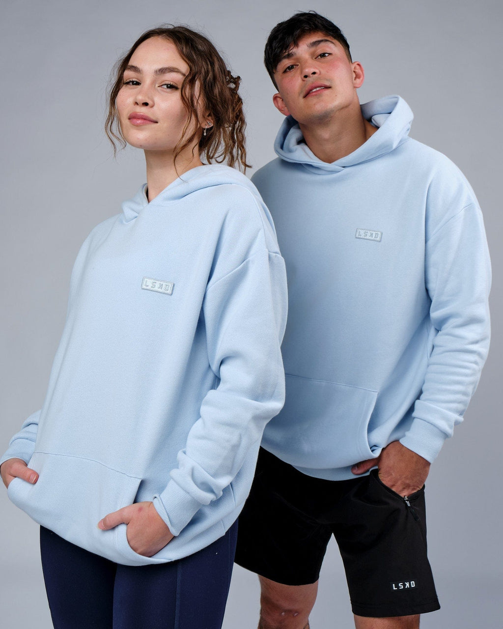 Model wearing Unisex Depth Hoodie Oversize - Sky Blue