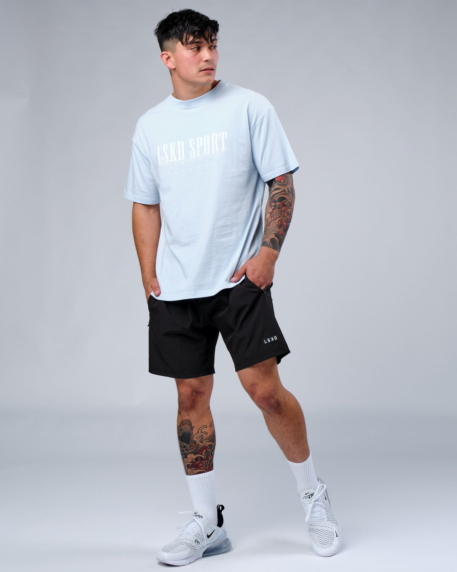 Model wearing Faculty Tee Vintage Fit - Sky Blue