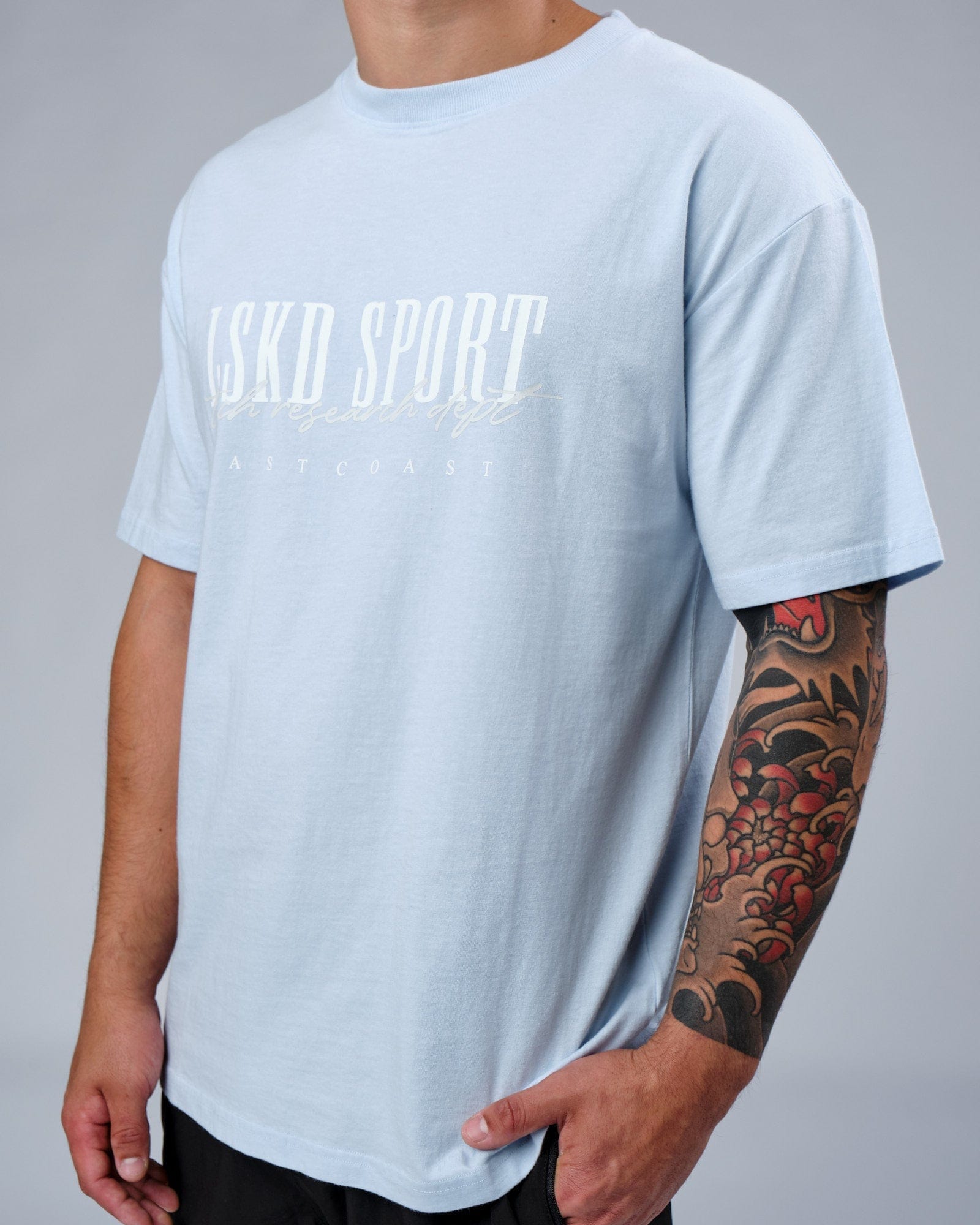 Model wearing Faculty Tee Vintage Fit - Sky Blue