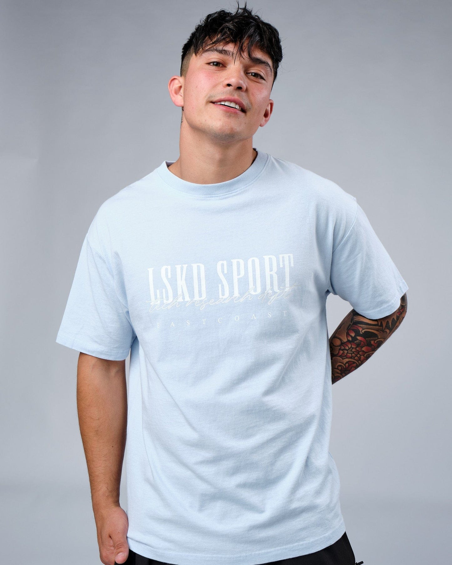 Model wearing Faculty Tee Vintage Fit - Sky Blue