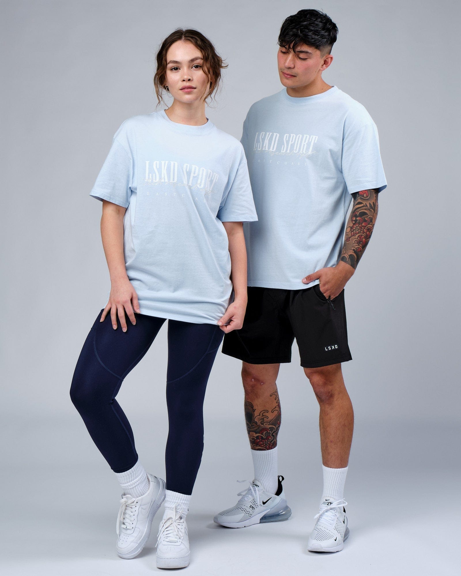 Model wearing Unisex Faculty Tee Vintage Fit Oversize - Sky Blue