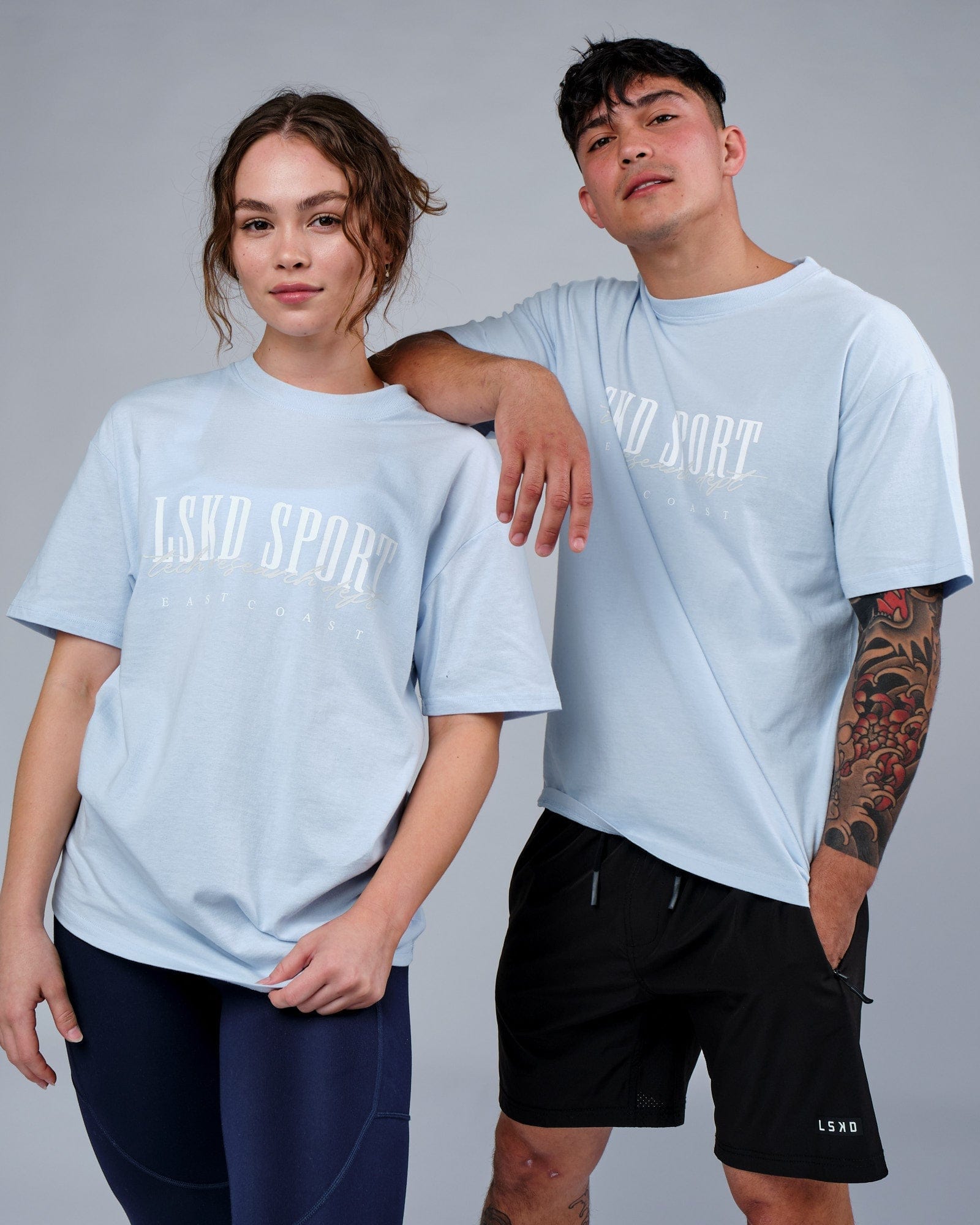 Model wearing Unisex Faculty Tee Vintage Fit Oversize - Sky Blue