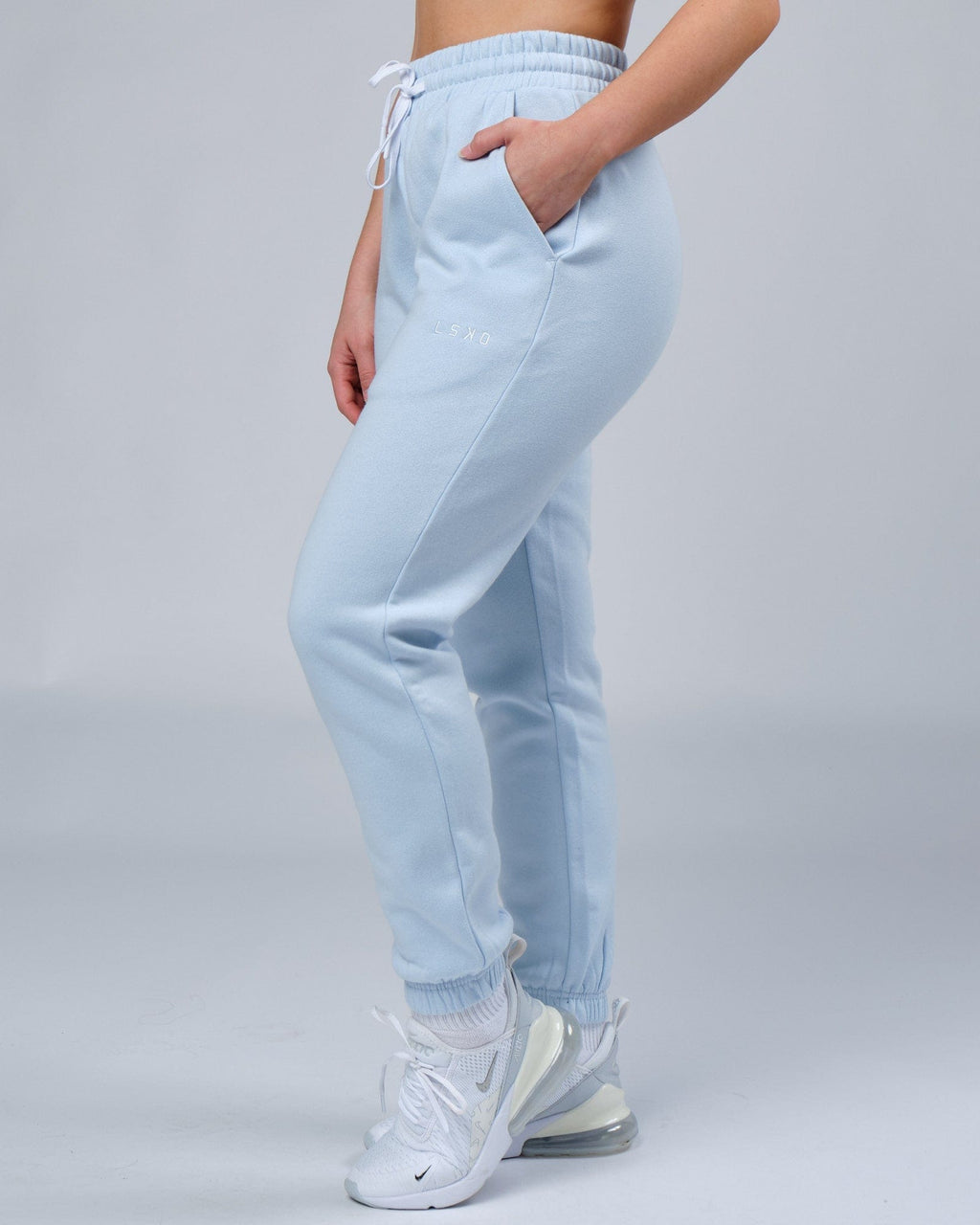 Model wearing Unisex Ready Track Pant - Sky Blue