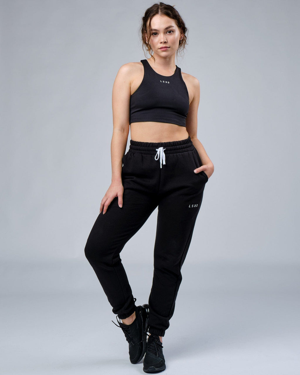 Model wearing Unisex Ready Track Pant - Black