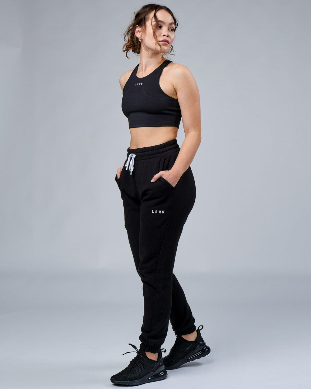 Model wearing Unisex Ready Track Pant - Black