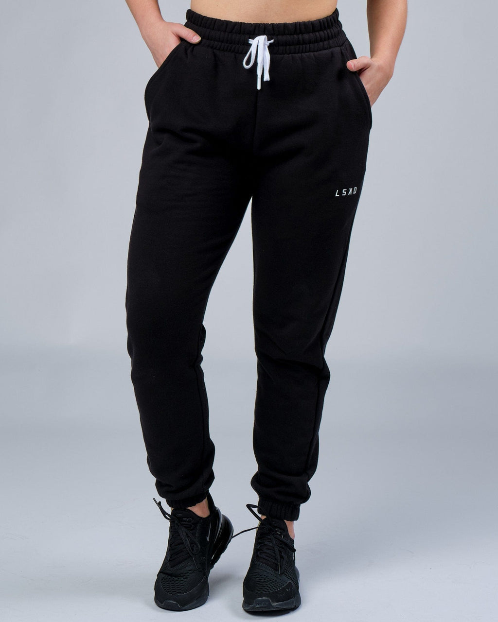 Model wearing Unisex Ready Track Pant - Black
