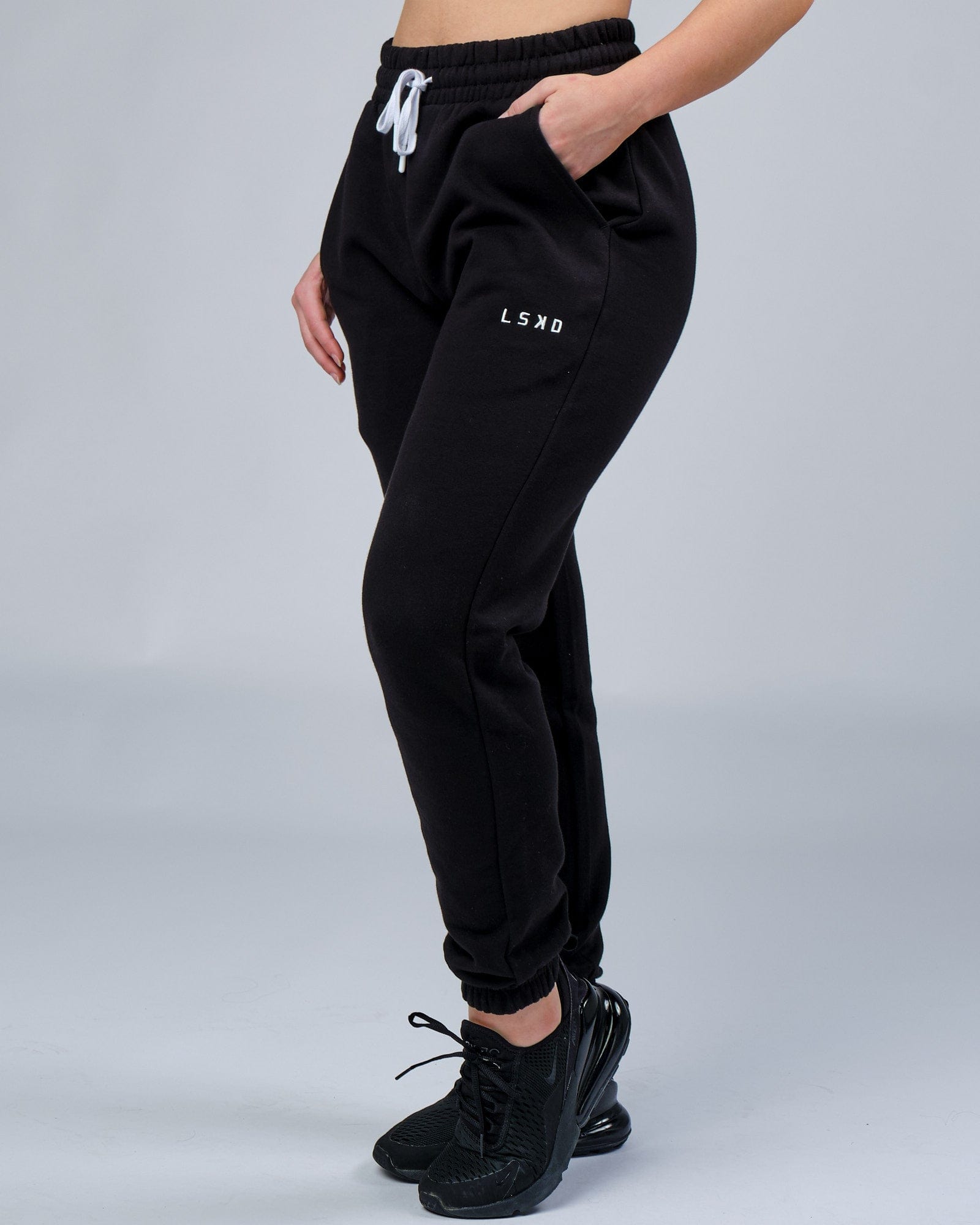 Model wearing Unisex Ready Track Pant - Black