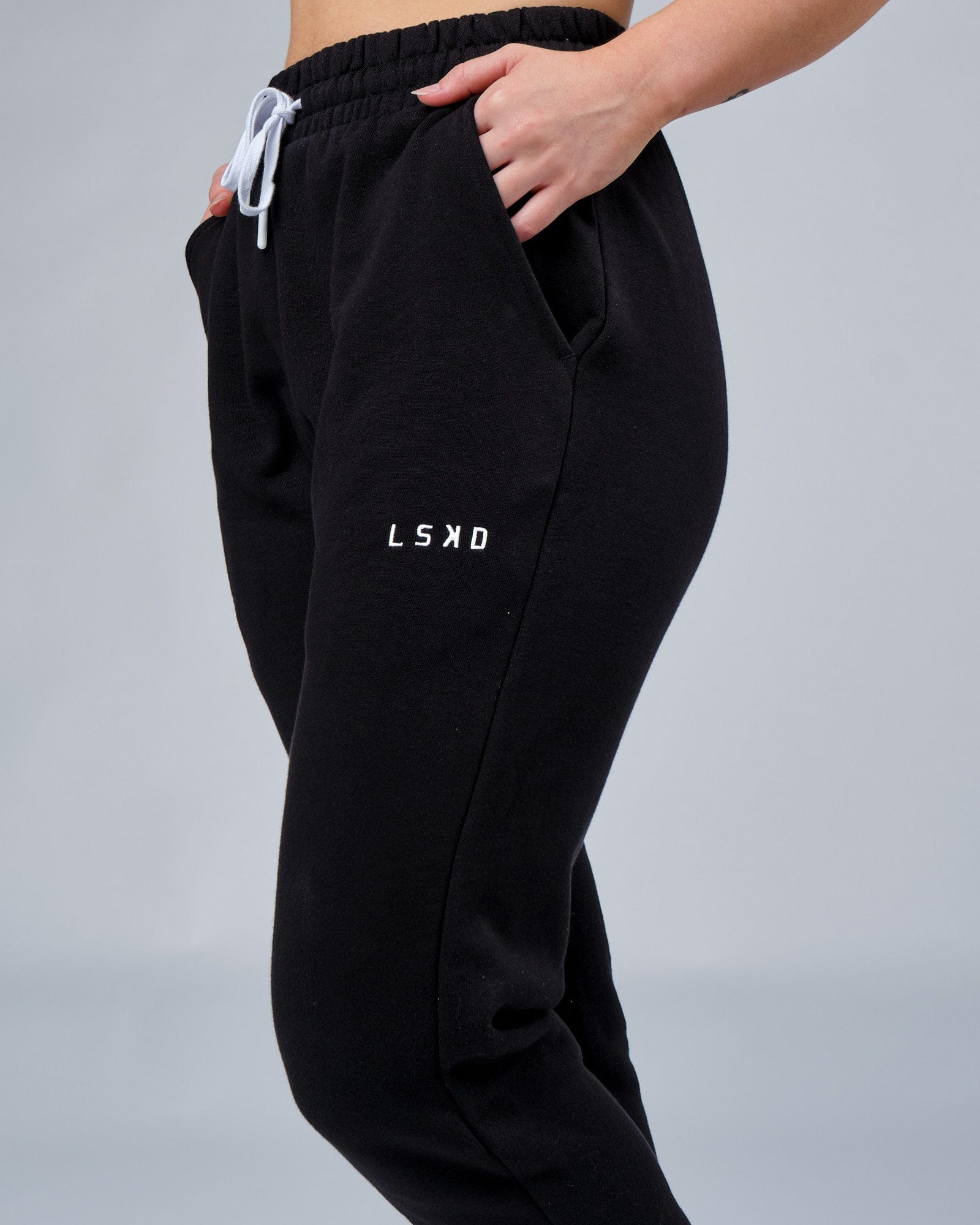 Model wearing Unisex Ready Track Pant - Black