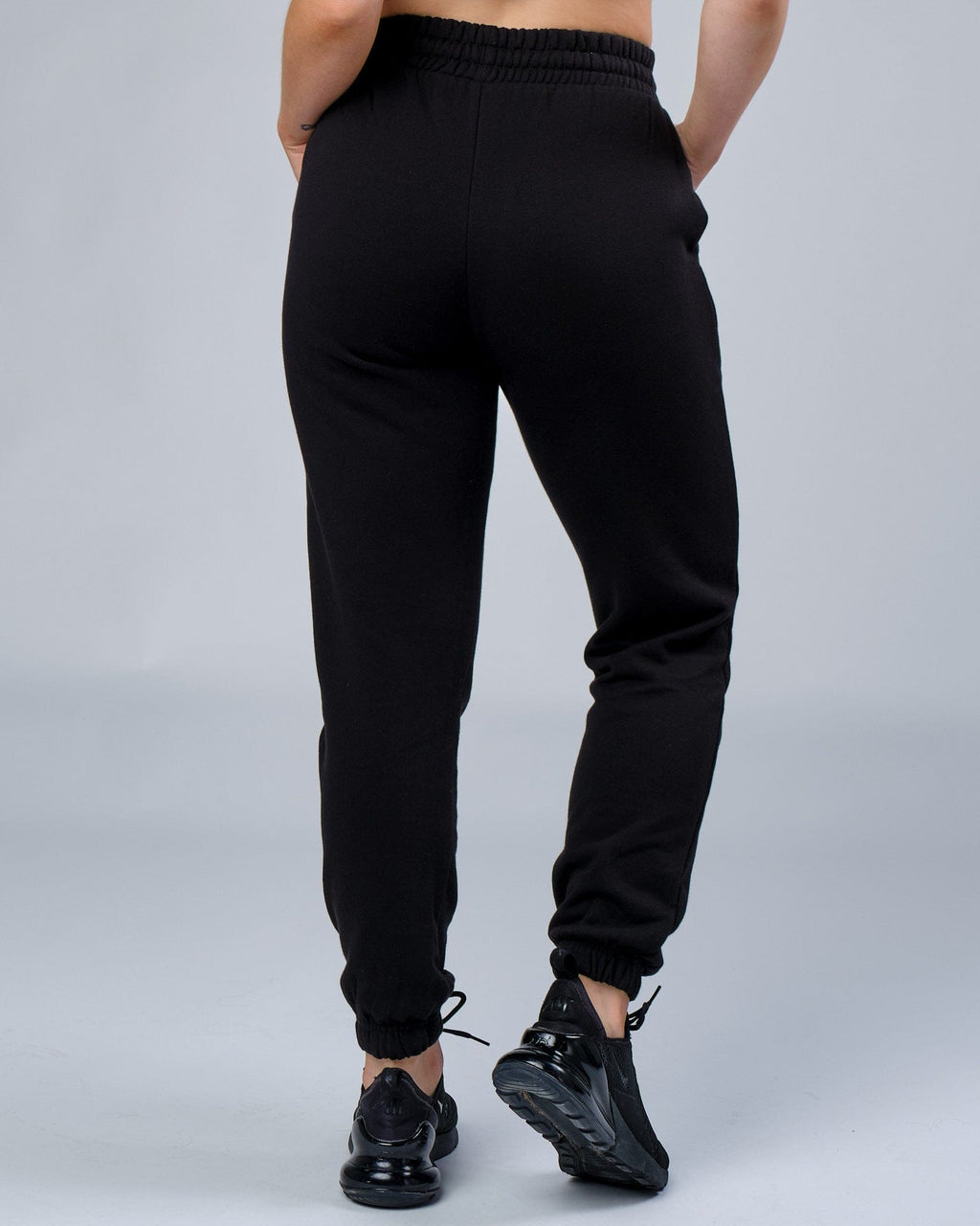 Model wearing Unisex Ready Track Pant - Black