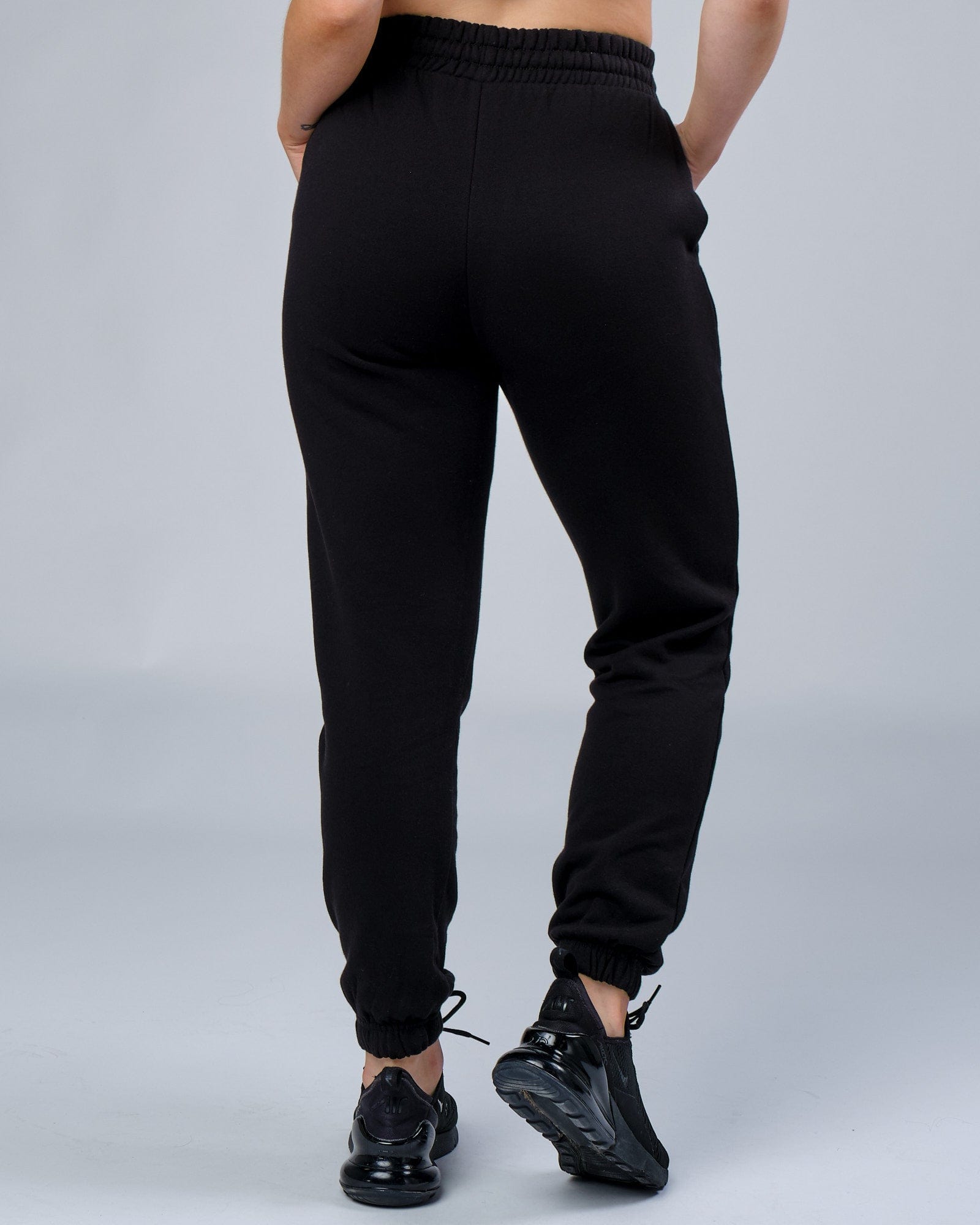 Model wearing Unisex Ready Track Pant - Black