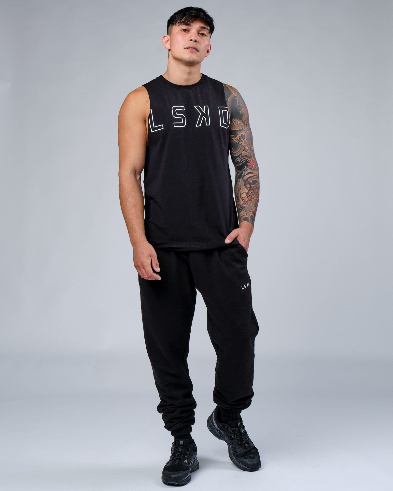 Model wearing Expand FLXCotton Training Fit Tank - Black